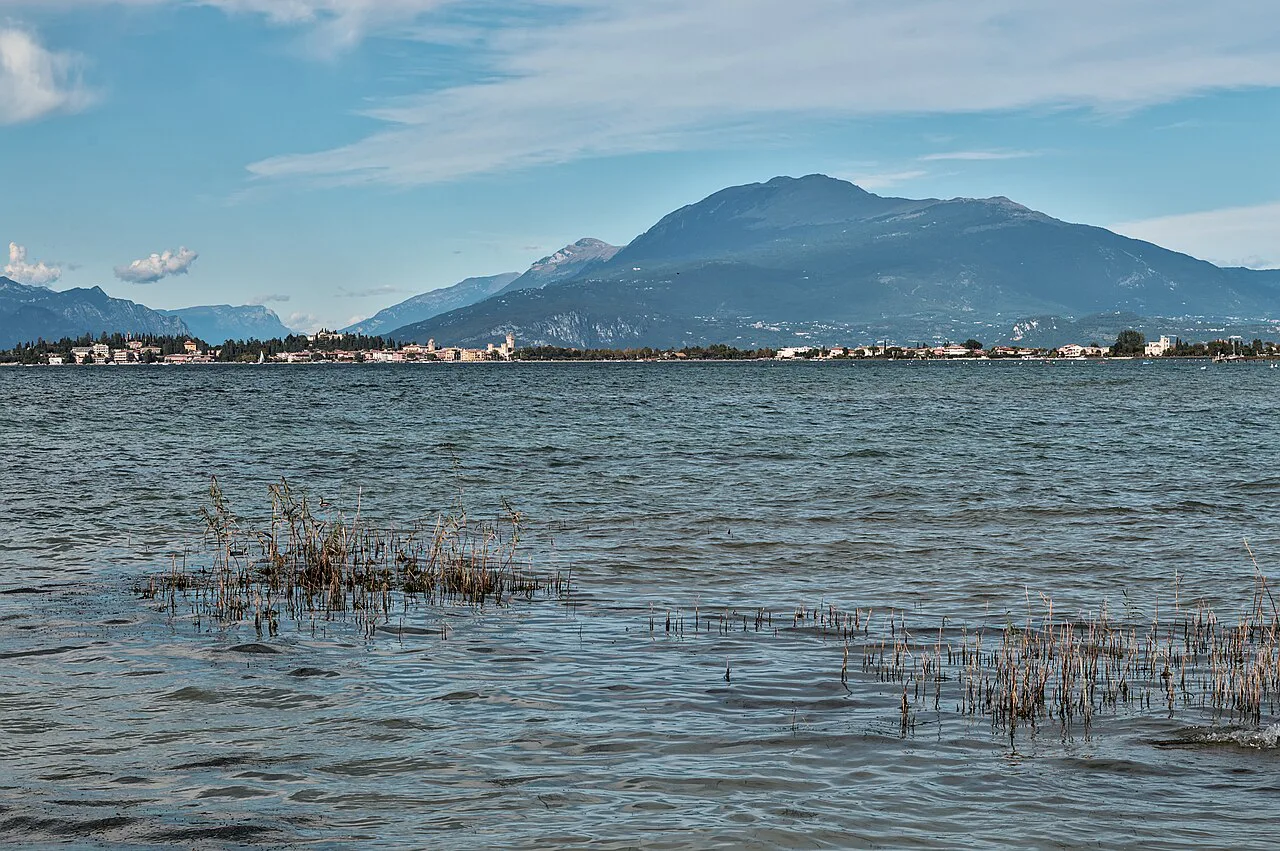 Sirmione and Monte Baldo seen from Rivoltella del Garda, Italy, Lake Garda