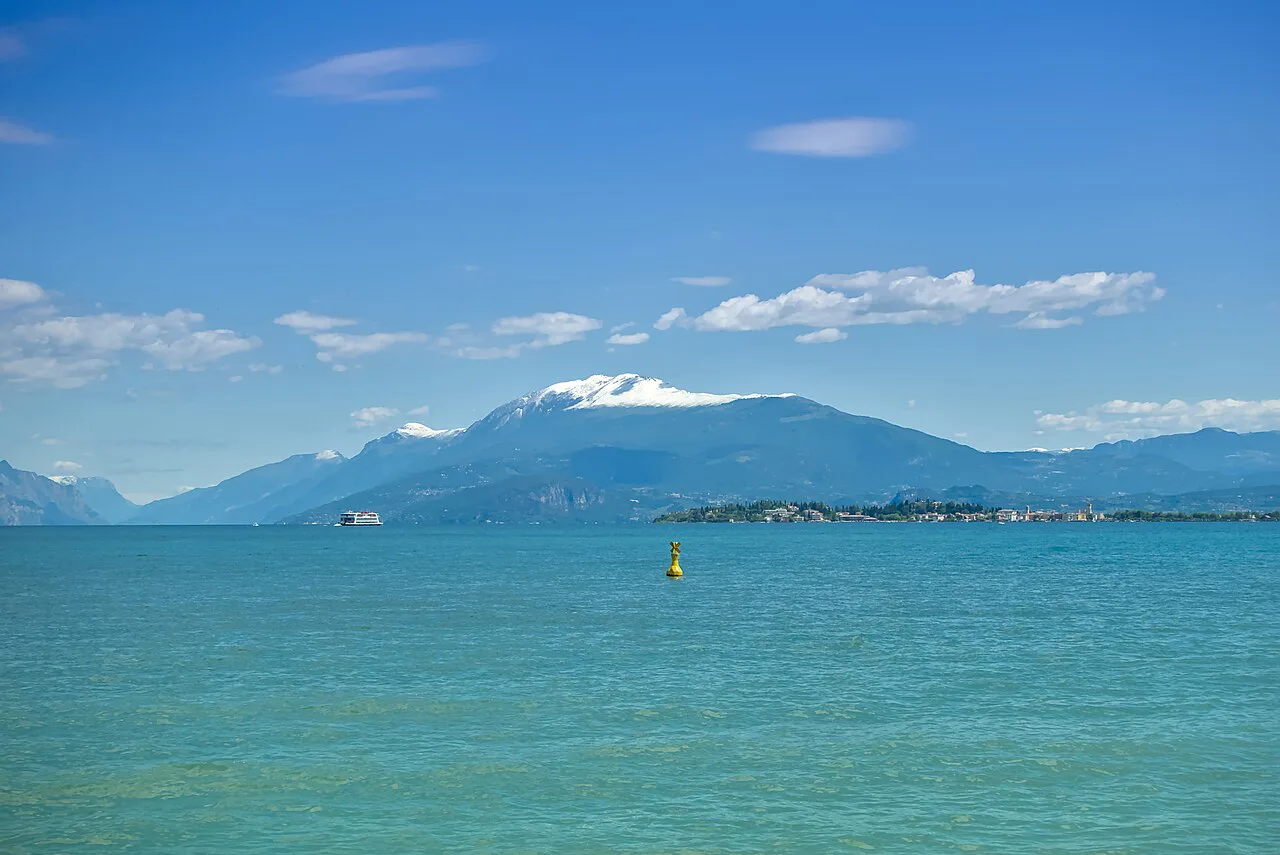 Sirmione and Monte Baldo seen from Desenzano del Garda, Italy, Lake Garda