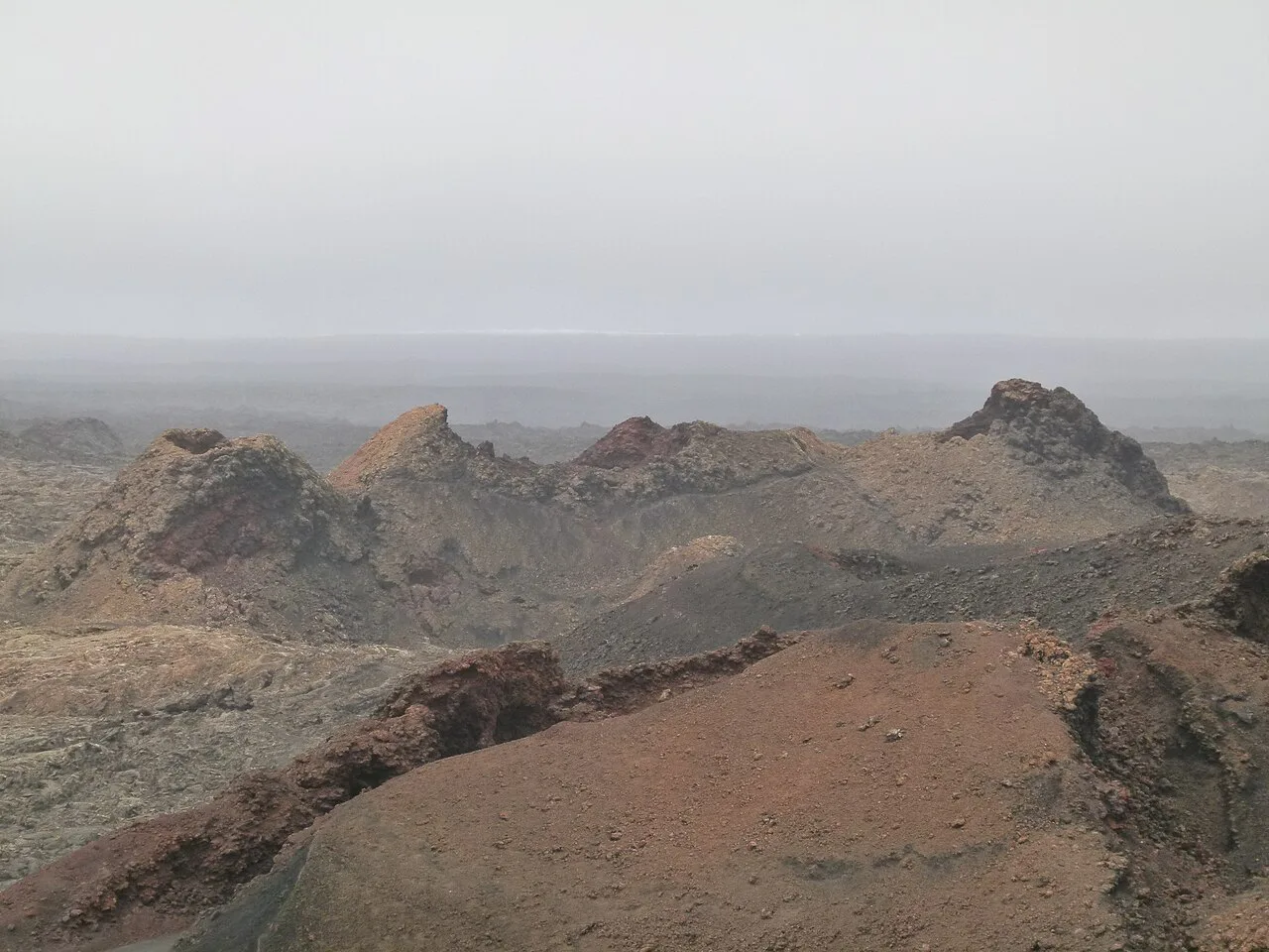 Montanas del Fuego, Timanfaya national park on a foggy rainy day, Lanzarote