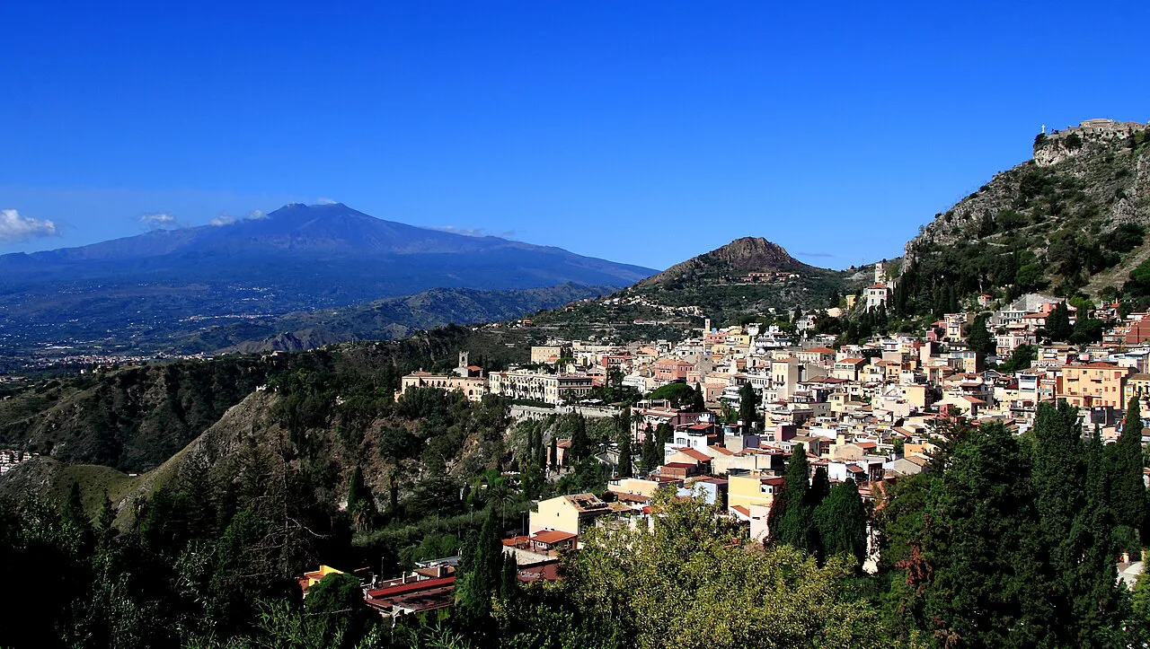 Mt Etna and Taormina as seen from the Ancient Theatre of Taormina, Sicily